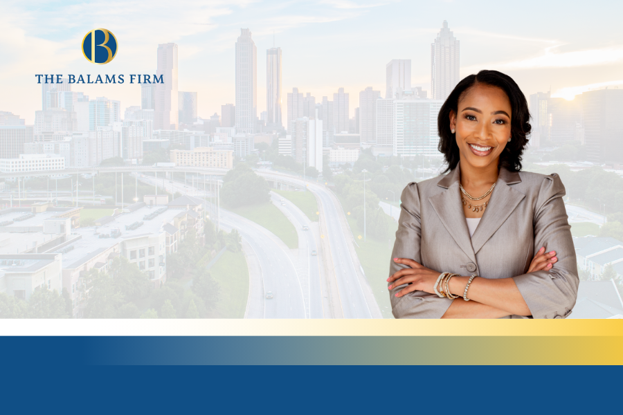 ReShea Balams posing against a backdrop of Atlanta, GA